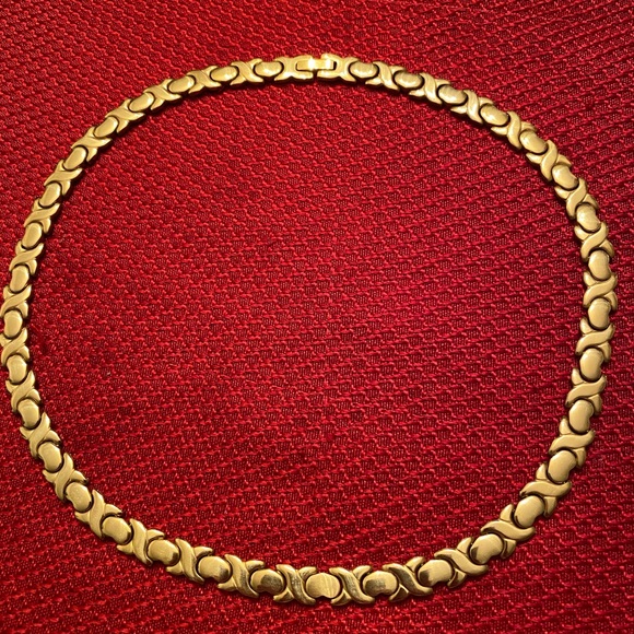 Jewelry - Stainless steel X and heart necklace.